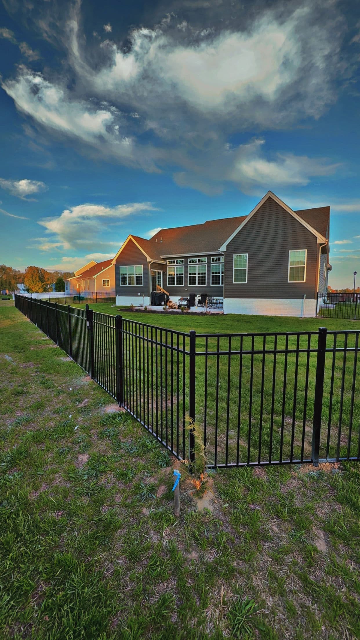 Gallery photos for Black Three-Rail Aluminum Fence Installed Around Beautiful Backyard: Image #2