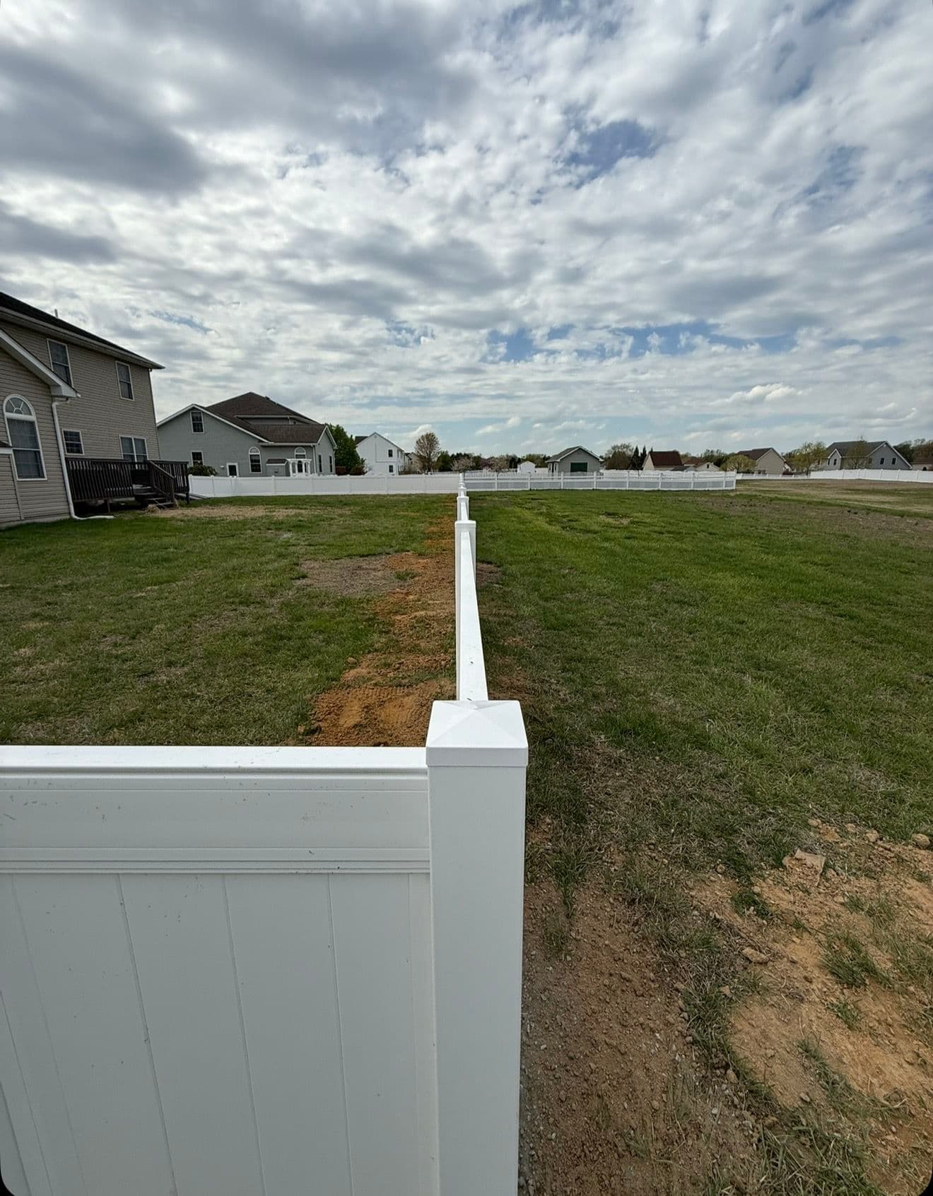 Gallery photos for 4-Foot White Vinyl Privacy Fence Keeps This Backyard Safe: Image #3