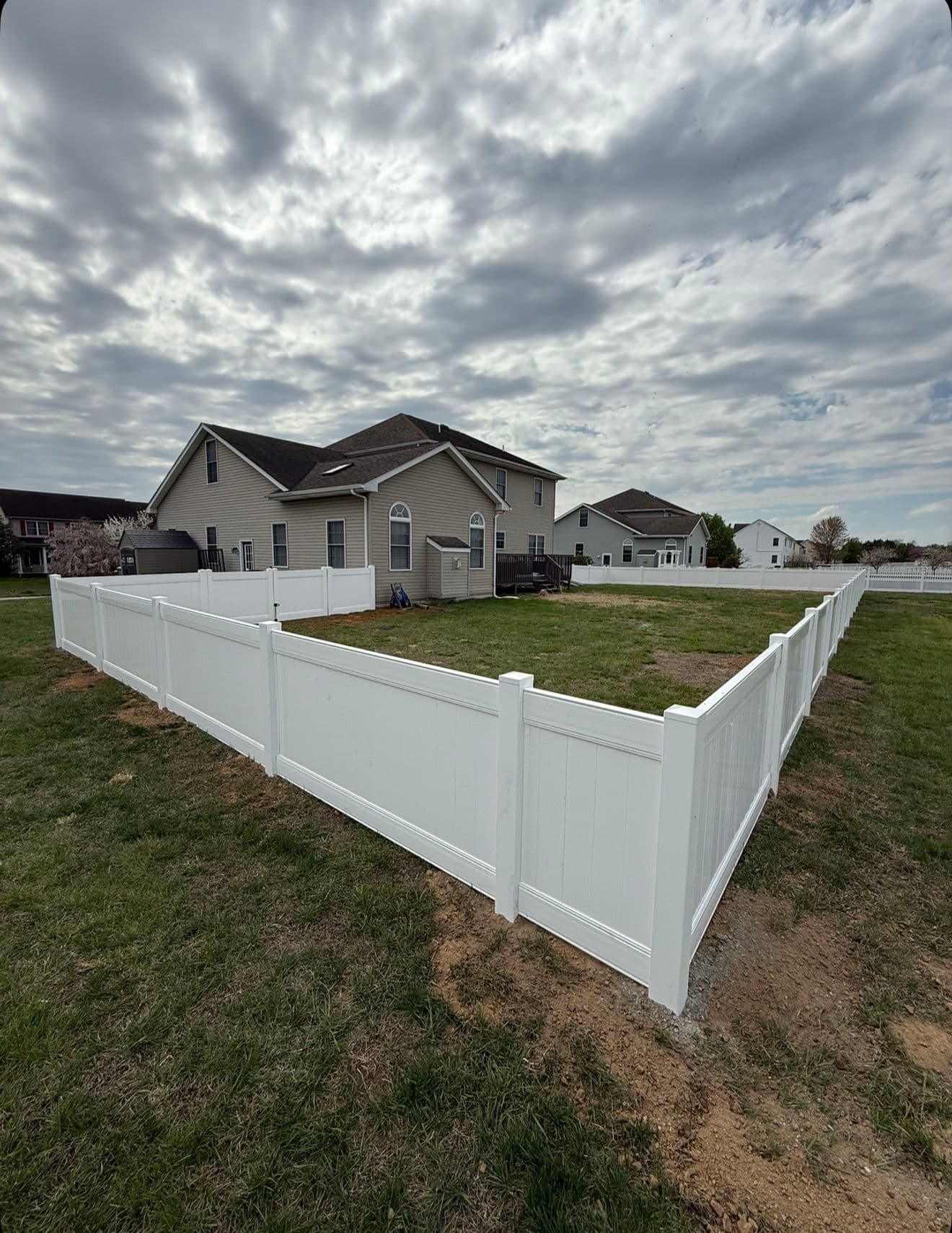 Gallery photos for 4-Foot White Vinyl Privacy Fence Keeps This Backyard Safe: Image #1