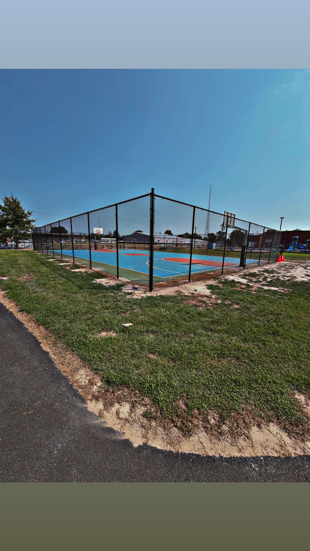 10-Foot Black Vinyl Chain Link Fence for a Basketball Court