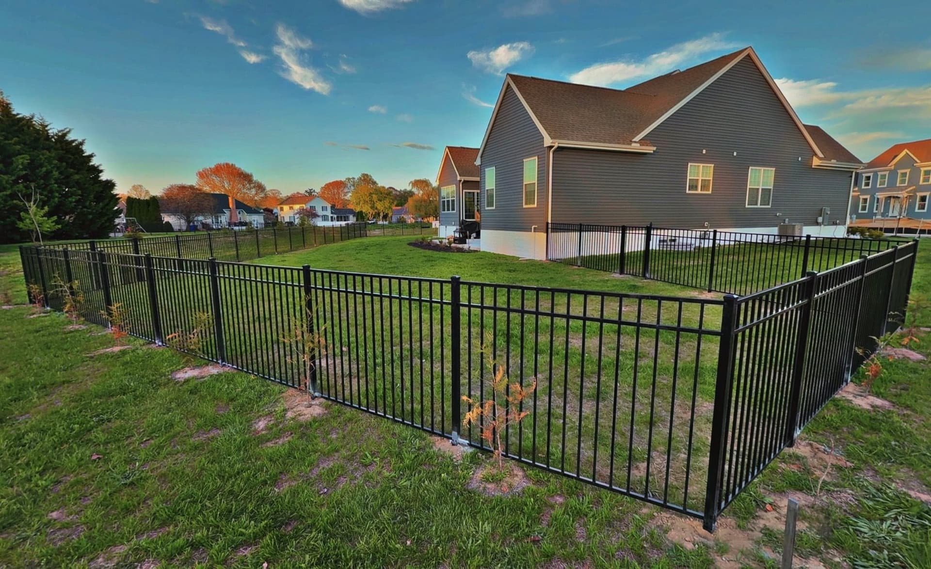 Gallery photos for Black Three-Rail Aluminum Fence Installed Around Beautiful Backyard: Image #4