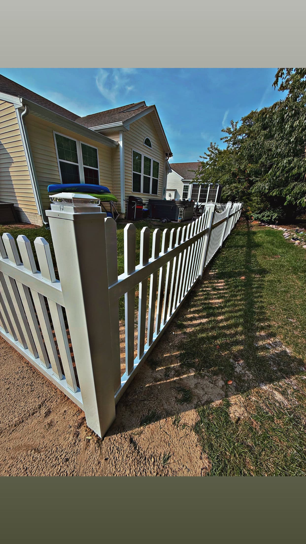 Gallery photos for White Vinyl Scalloped Picket Fence with Solar Post Caps and MagnaLatch Gate: Image #1