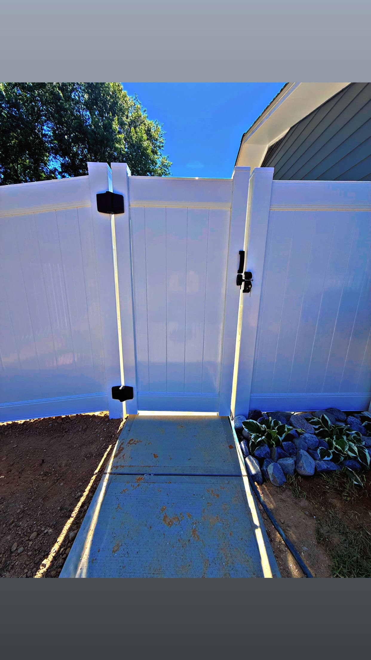 Gallery photos for White Vinyl Privacy Fence With a Custom Height Transition: Image #2